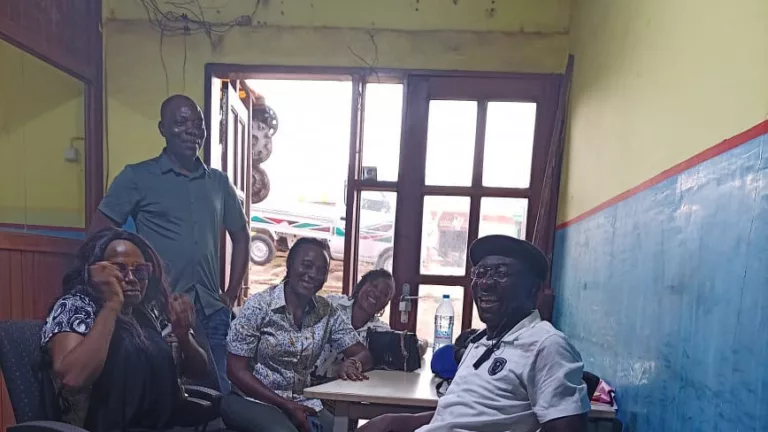 Kingsley Njoka with his lawyer Amungwa Tanyi Nicodemus, friends and family, upon his release